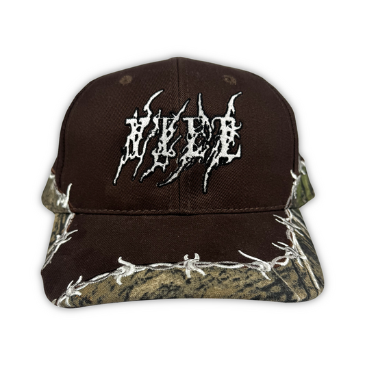 VFCC-82-WHITE-LOGO-BARB-WIRE-CAP